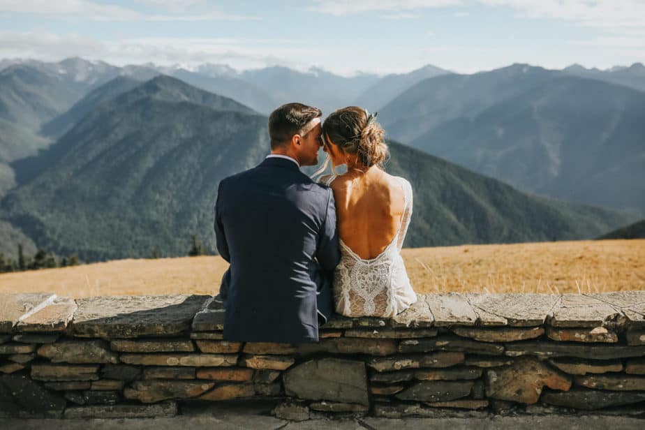 Bride and groom overlook the mountains during their Hurricane Ridge elopement.