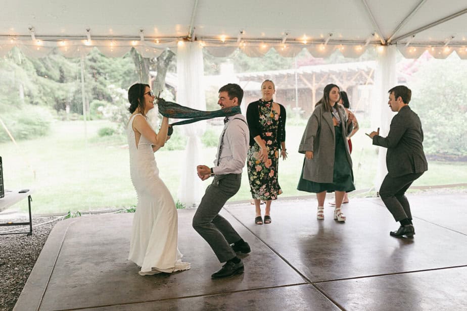 Reception guests dance at Fern Acres in Forks, Washington.