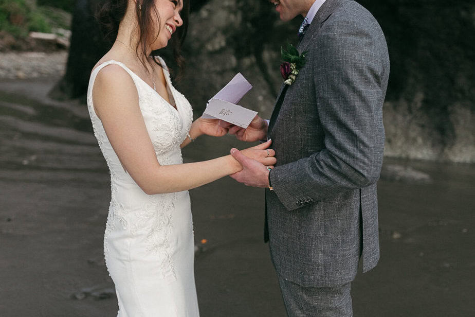 Bride and groom exchange private vows on Second Beach in La Push, Washington.