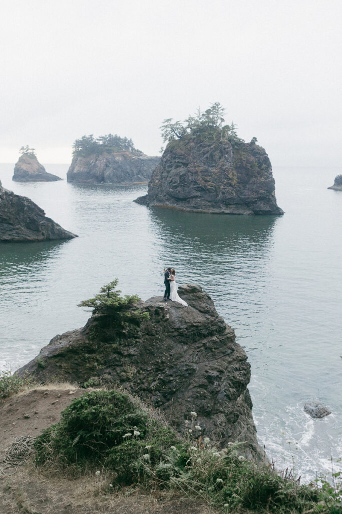 Bride and groom say private vows on a private beach in Brookings, Oregon.