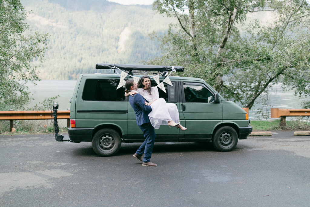 Bride and groom have a coffee on their elopement day outside of Forks, Washington.